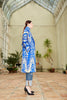 Side view of a model wearing a Silk Ikat Shawl Coat – Shahlo, hand woven by the artisans of Uzbekistan