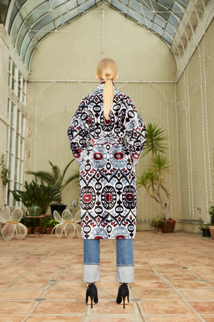 Back view of a model wearing a Silk Velvet Ikat Shawl Coat - Gulya