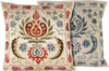 Side view of the luxurious hand-embroidered Red Tulips Silk cushion with a blue tulip flower Silk cushion in the background. 