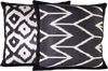 Close-up view of the beautiful Black and White Chevron Pattern Silk Ikat cushion made with fabric that is hand-woven and hand-dyed with another black and white Silk cushion on the side. 