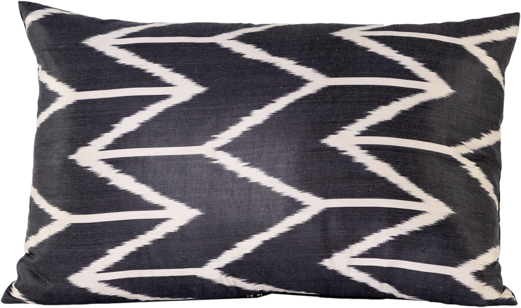 Front view of the beautiful Black and White Chevron Pattern Silk Ikat rectangle cushion made with fabric that is hand-woven and hand-dyed.