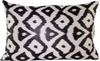 Front view of the beautiful Black and White Geometric Patterned Silk Ikat rectangle cushion made with fabric that is hand-woven and hand-dyed.