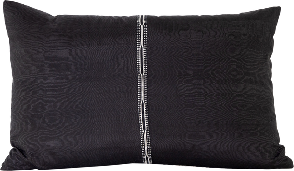 Reversed view of the beautiful Black and White Geometric Patterned Silk Ikat rectangle cushion in black with a traditional hand-made central braid. 