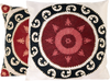 Front view of two luxurious hand-embroidered Central Sun Disk Silk cushion.