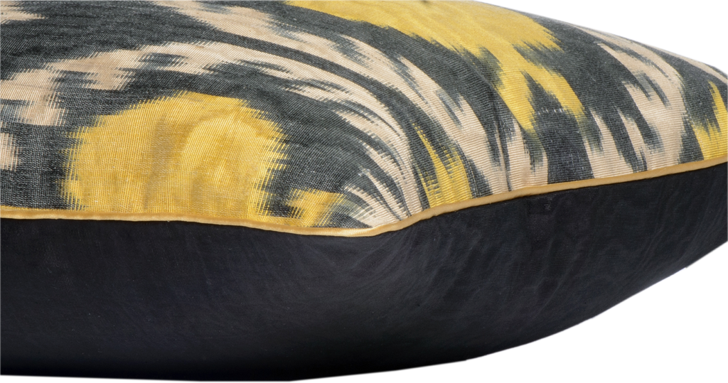 Side view of two luxurious hand-woven Silk Ikat - Yellow Pomegranate cushions.