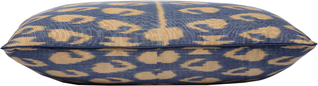 Side view of the hand woven reversible Silk Ikat Cushion with Dark Blue and Cream pattern