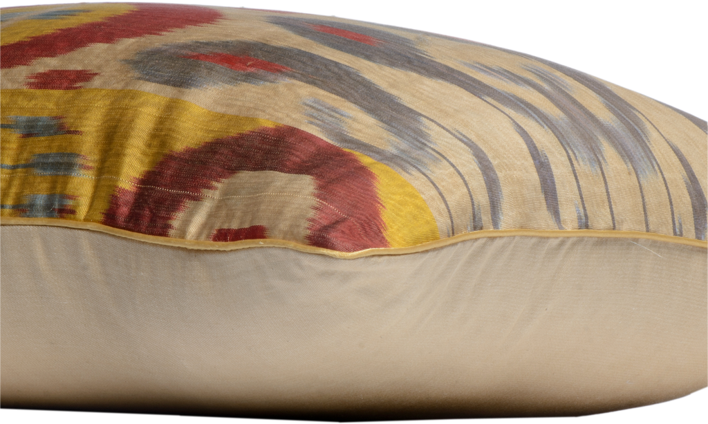 Side view of the luxurious hand-woven Silk Ikat cushion in Red, Yellow and Grey Shades. 