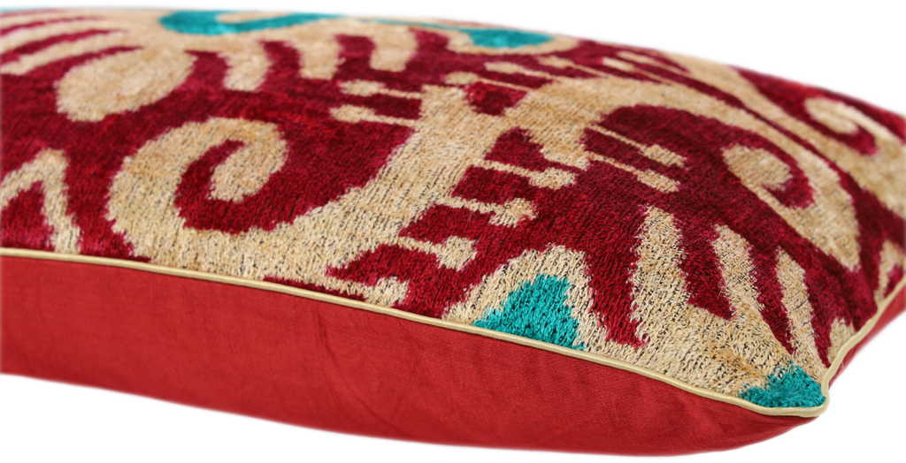 Side view of the luxurious hand-woven Silk Velvet Ikat - Red, Aqua and Cream cushion.