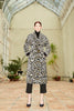 Front belted view of a model wearing the Silk Velvet Ikat Shawl Coat - Leopard