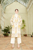 Model wearing a beautiful hand woven Silk Ikat Chapan Coat – Nargiza
