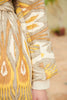 Close-up view of the sleeve on the Silk Ikat Chapan Coat – Nargiza 