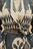 Close-up view of a model wearing a silk ikat shawl coat - Farida 'Special'