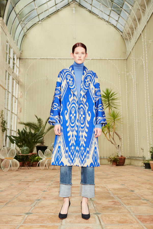 Model wearing a Silk Ikat Shawl Coat - Shahlo, created by the artisans of Uzbekistan