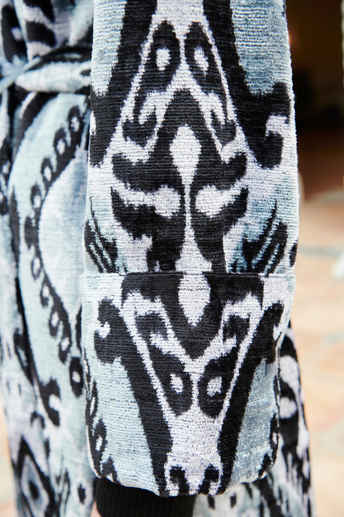 Close-up view of the design on the Silk Velvet Ikat Shawl Coat - Azoda