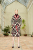 Front belted view of a model wearing the Silk Ikat Shawl Coat - Zilola