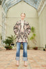 Model wearing a hand woven classic cut Silk Ikat jacket - Lola with hands in the pocket