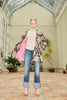 Model wearing Anor’s Silk Ikat Lola jacket with a pink 100% silk lining